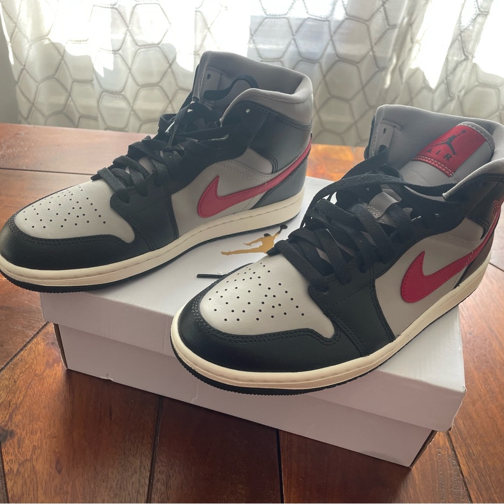Brand New Women’s Air Jordan 1 high top 9.5 (red/grey/black) gym shoes /sneakers